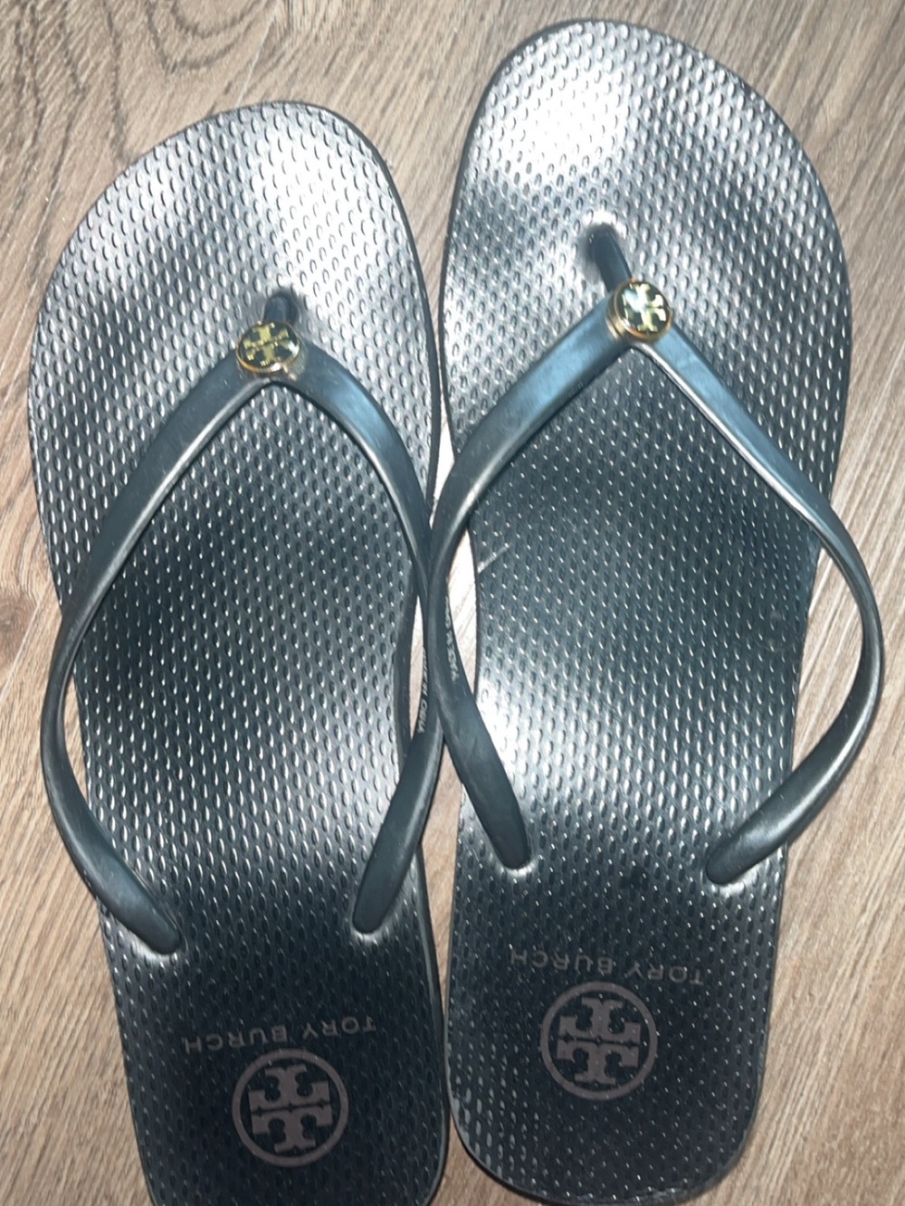 Tory Burch Metallic Black Jelly Flip Sandals with Gold Logo